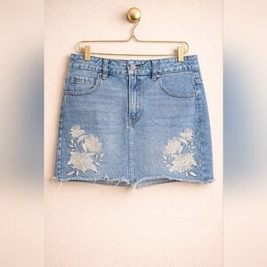 PacSun Blue Denim Mini Skirt with White Floral Embroidery
